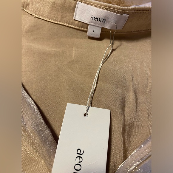 BNWT AEOM Women's cream shimmering Twist
Top Blouse Long Sleeve Size L - Picture 8 of 8